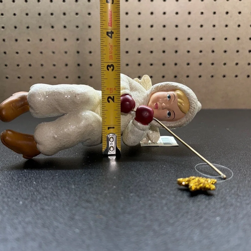 Midwest of canon falls shelf angel with fishing pole & star on the end figurine